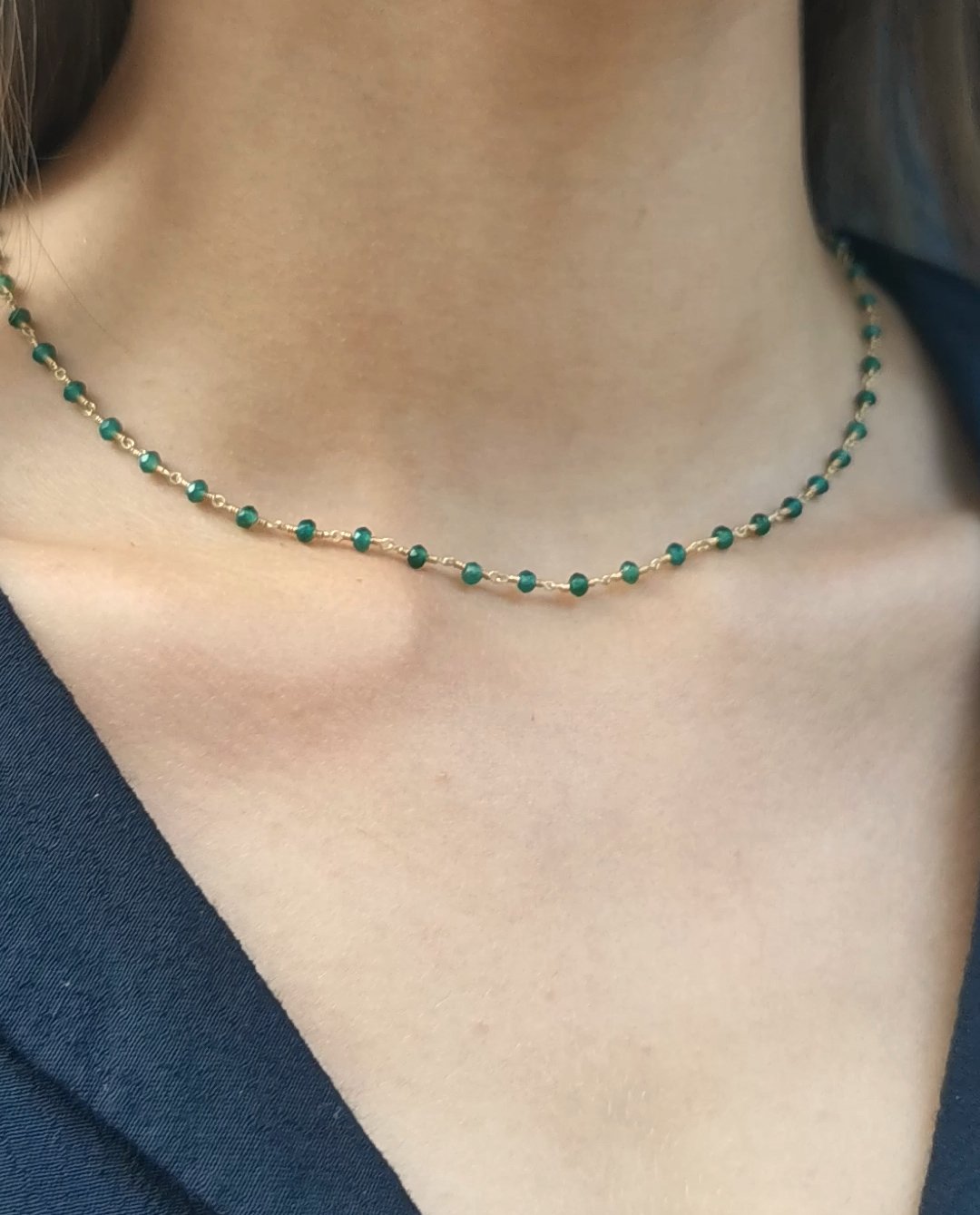 necklace with green aventurines close up